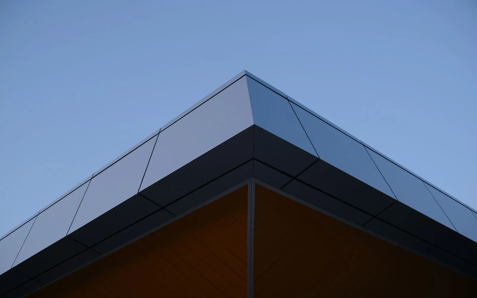 Gutter sizes and types: a profile comparison of 5-inch and 6-inch K-style gutters on a home exterior