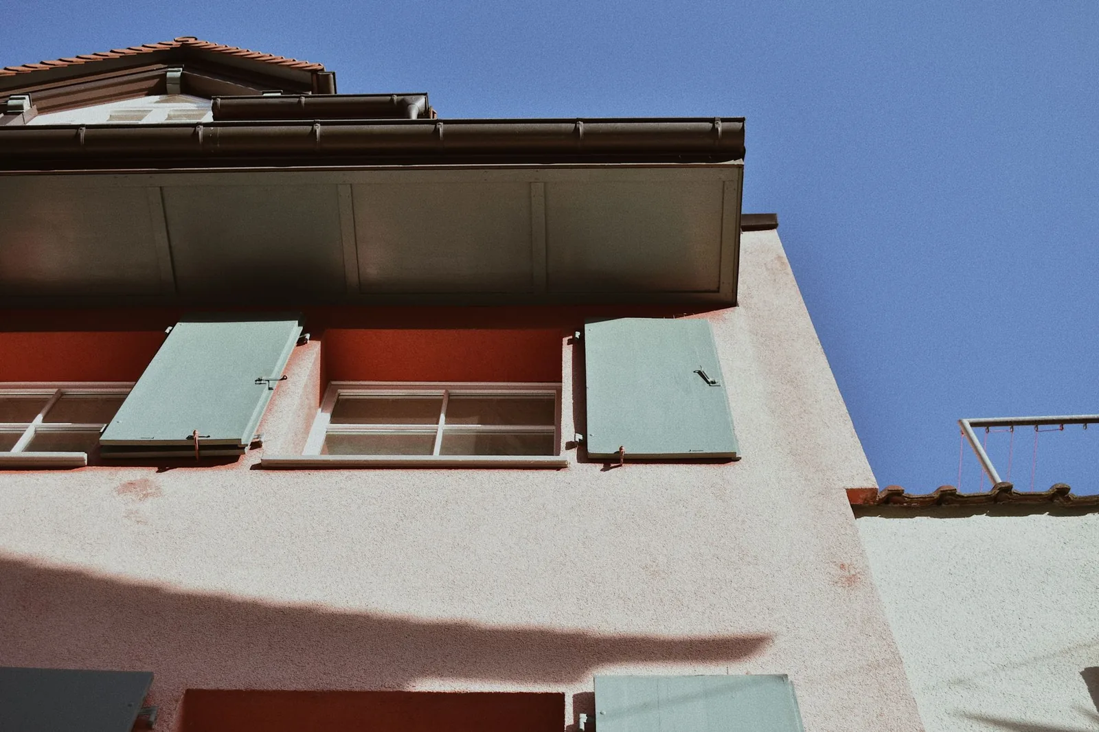 Downspouts, fascia condition, and roofline height all add to the total gutter installation budget