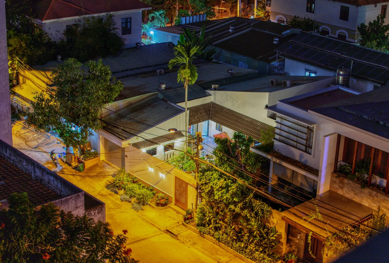 Motion sensor floodlight on a brick exterior wall